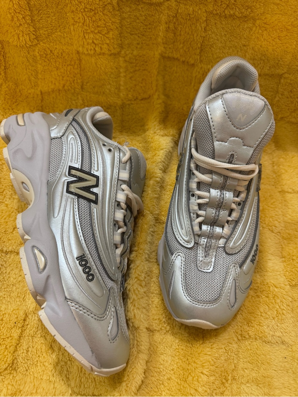 New Balance Silver and Light Gray Runner Sneakers